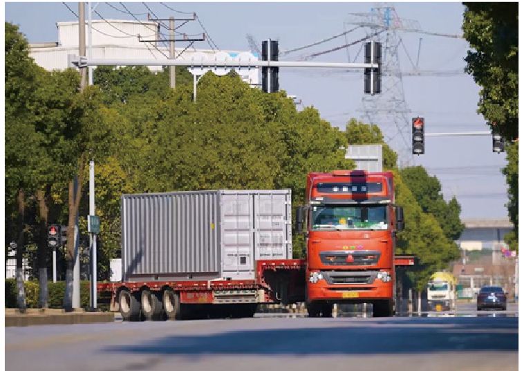 Container transported to site by truck