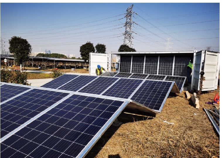 Solar PV array unfolding from container